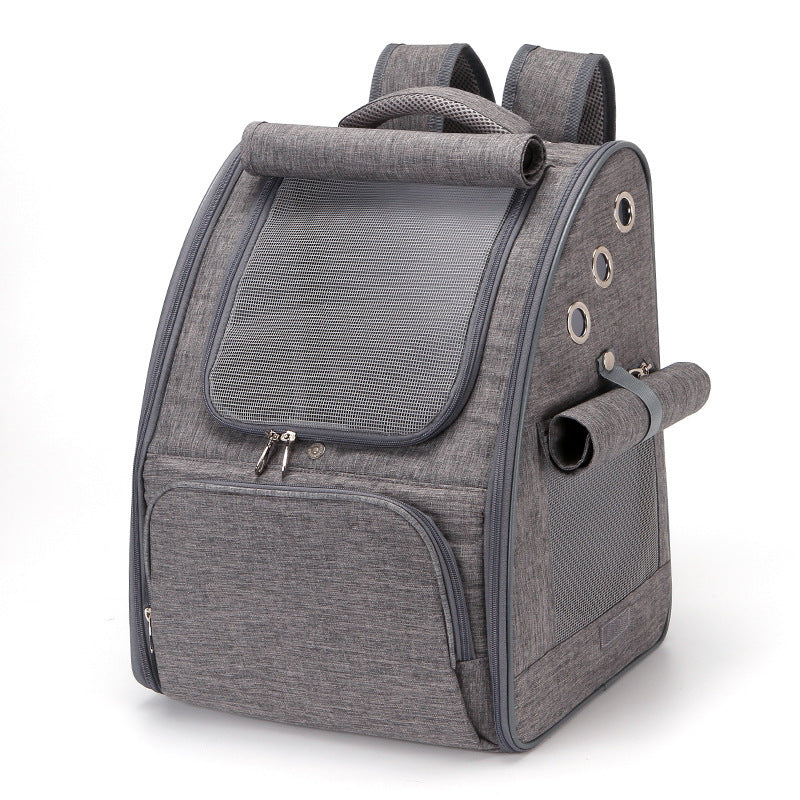 Blue dog backpack carrier showing a happy cat sticking out its tongue, ideal for traveling with pets.